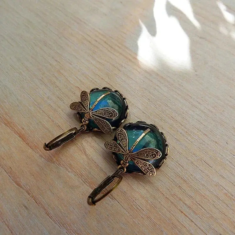 Spherical dragonfly earrings in antique gold