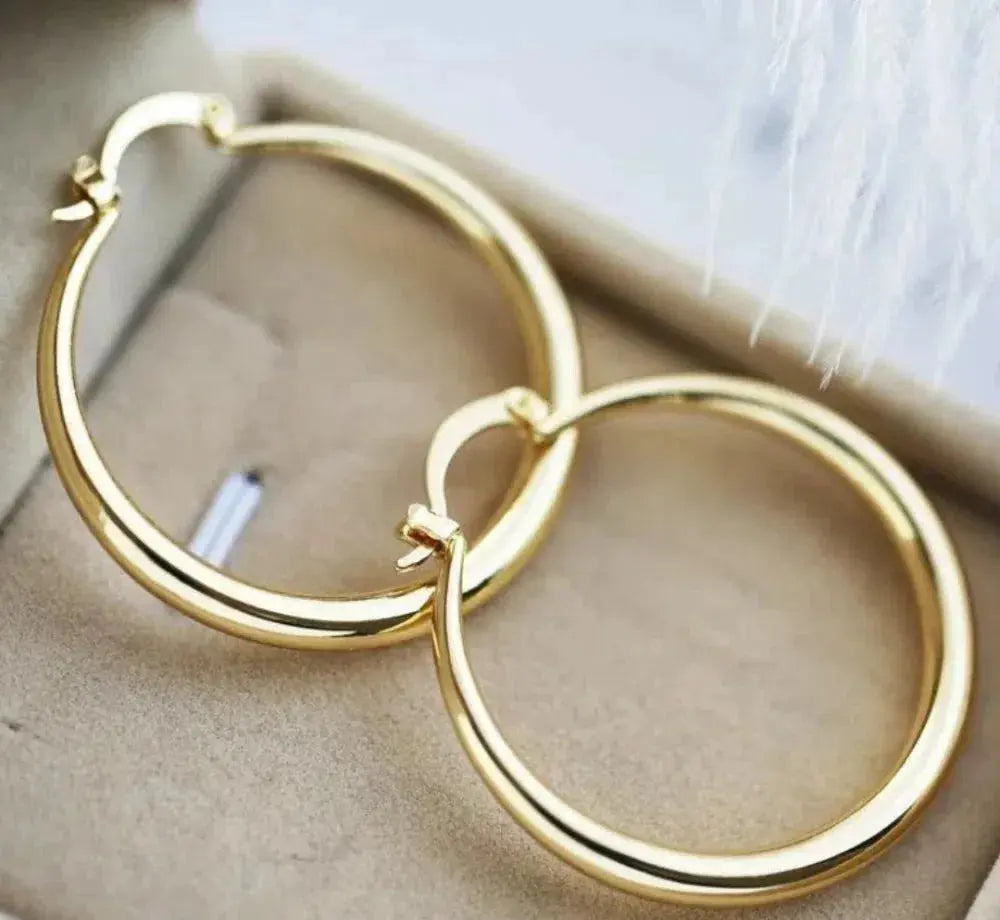 large-hoop-earrings-in-gold-140.webp